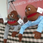 Puppets (sent from the UK) being used in the camp